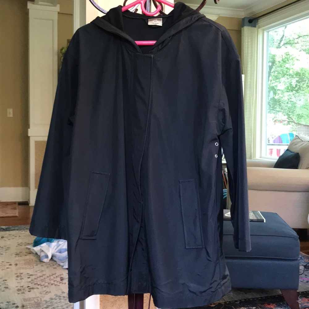 Black poly zippered raincoat.